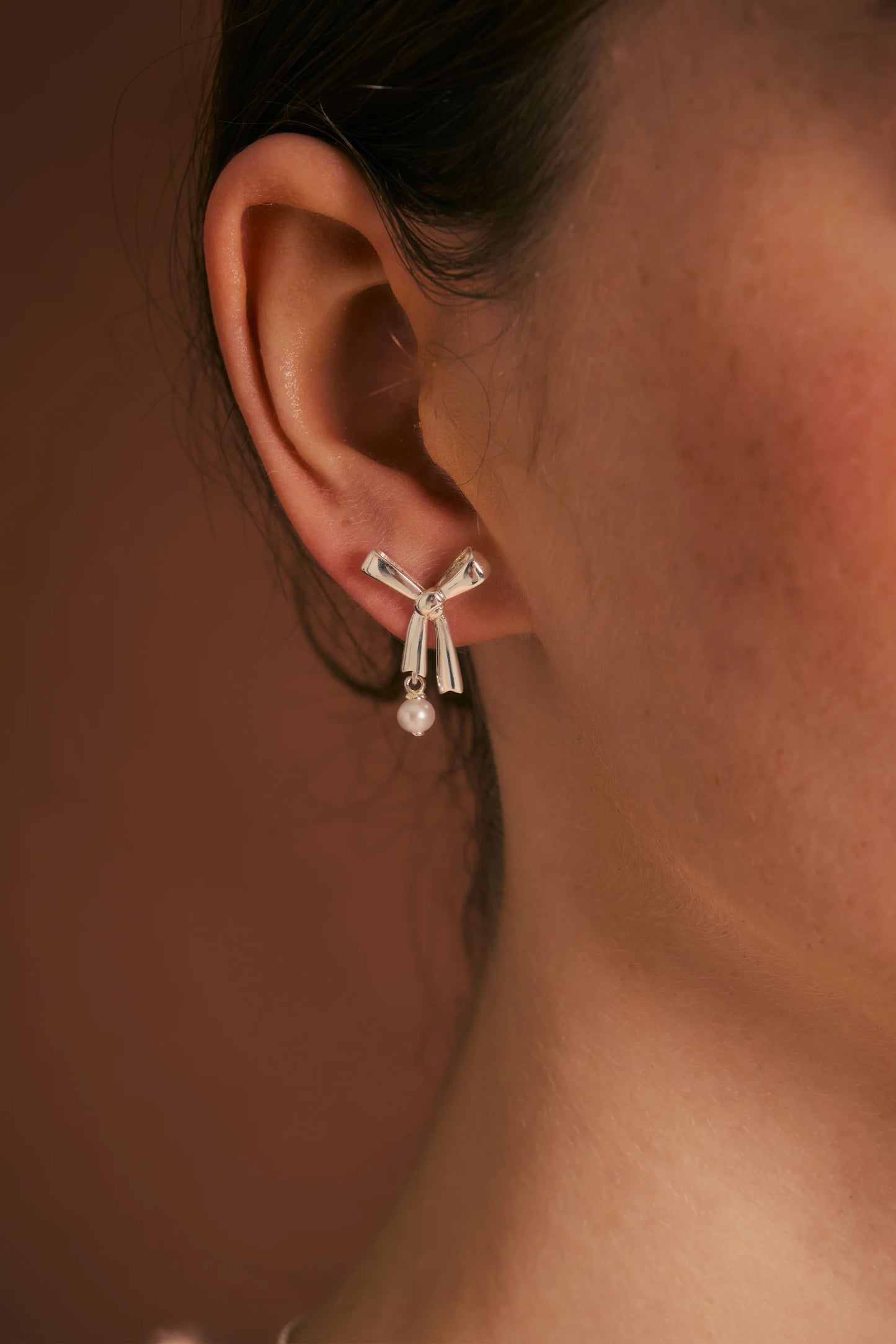 Sterling Silver Pearl Bow Stud Earrings