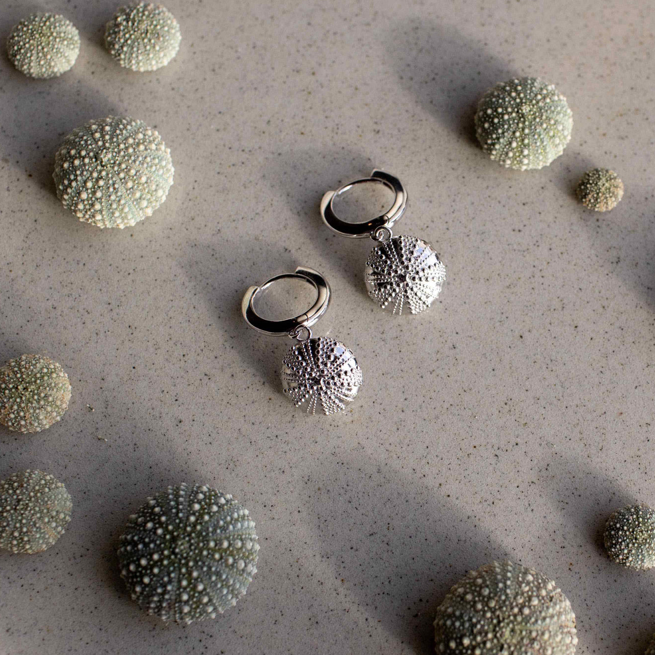 Sterling Silver Kina Huggie Earrings