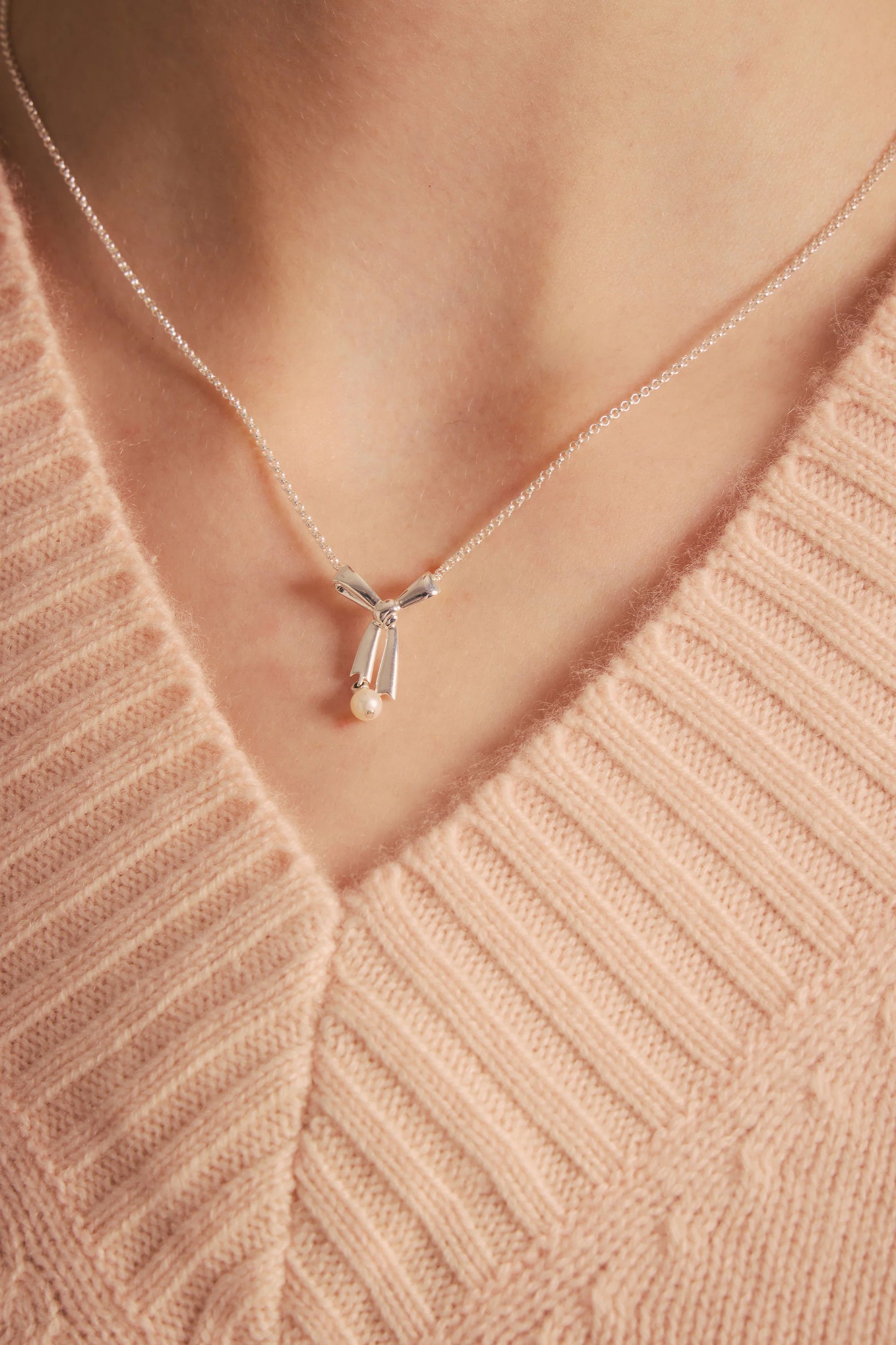 Sterling Silver Pearl Bow Necklace