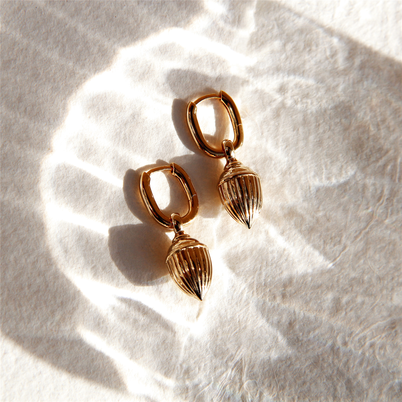 Raya Ridged Pod Huggie Earrings - Gold Plated