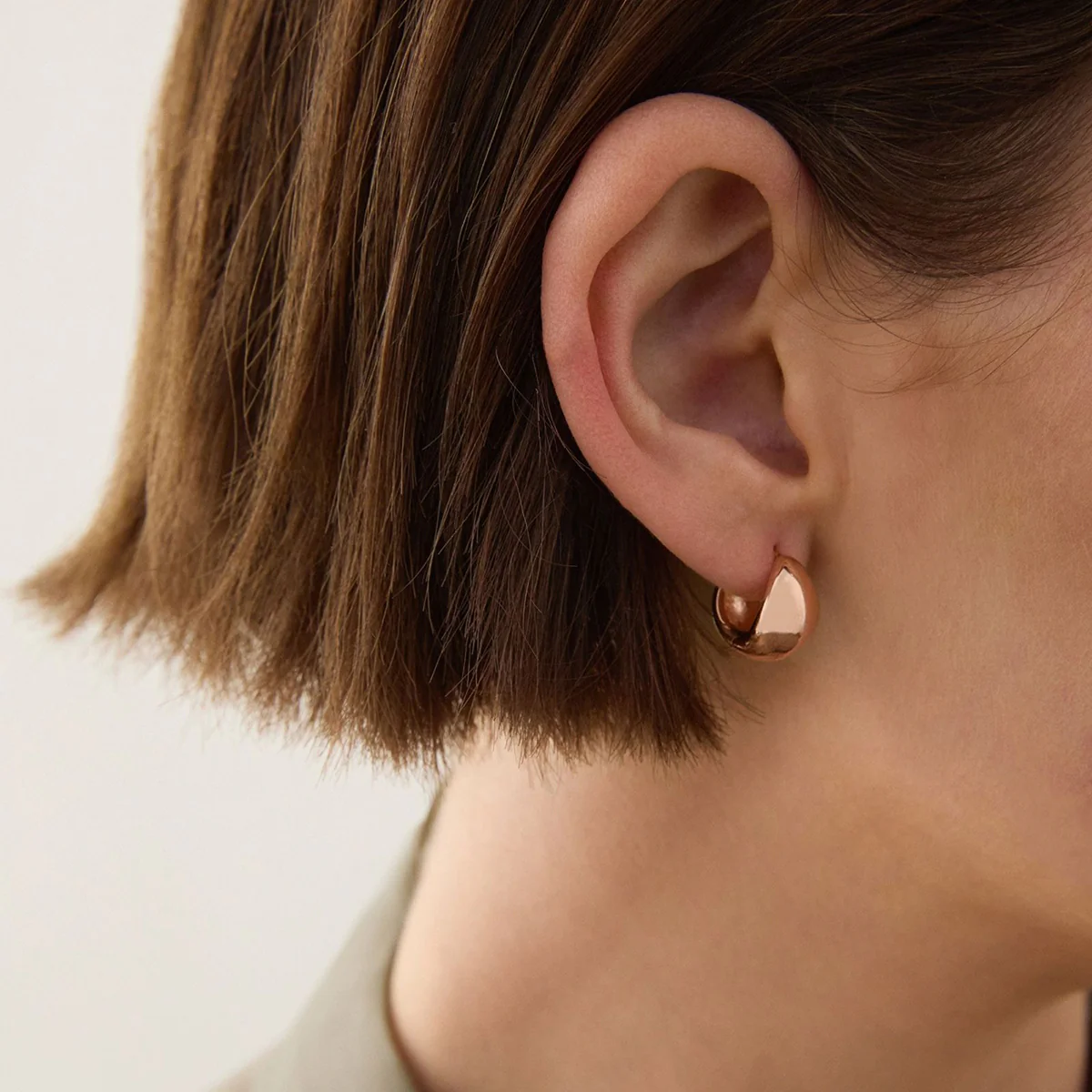 La Muse Huggie Earrings - Rose Gold Plated